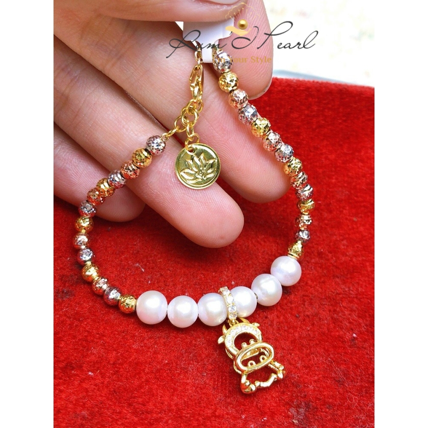 Vòng tay vàng 18K phối ngọc trai và charm 